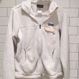 white Patagonia zip up jacket